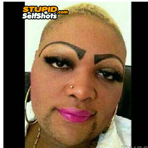 She or he has messed up eyebrows and a goatee