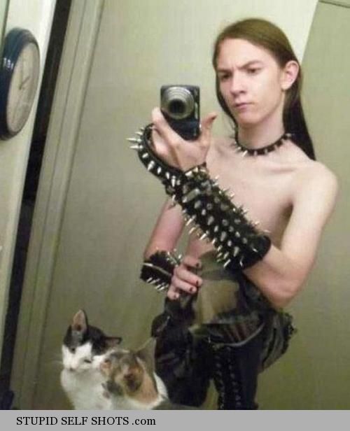 Cats, spiked gloves, and mirror self shots