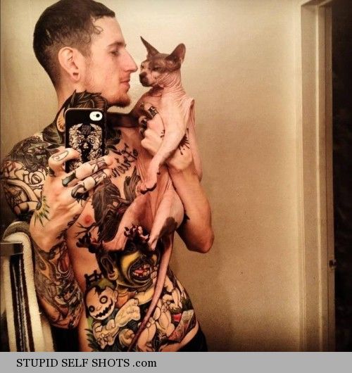 Creepy cat & ugly tattoo self shot