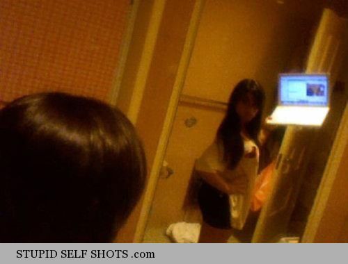 Girl with a laptop mirror self shot