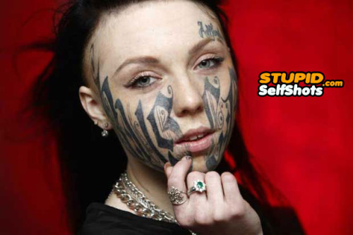 Massive face tattoo fail on a girl, self shot