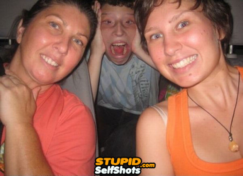 Weird kid photobombed a parent selfie