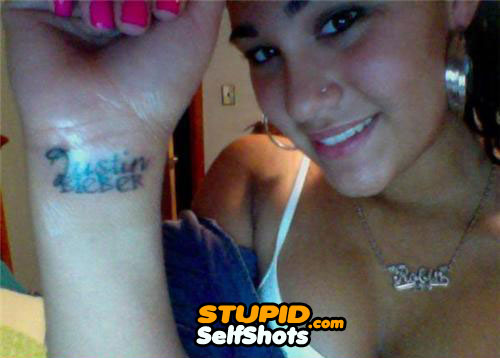 Justin Bieber self shot tattoo fail