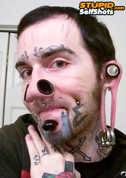 Seriously stupid face piercings, self shot